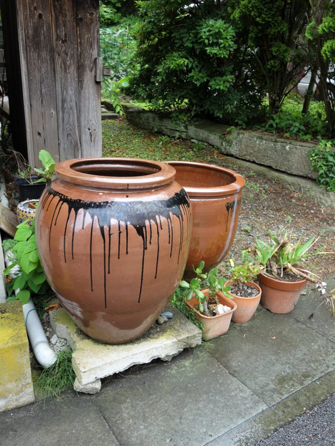 Water jugs along the street of Omori district