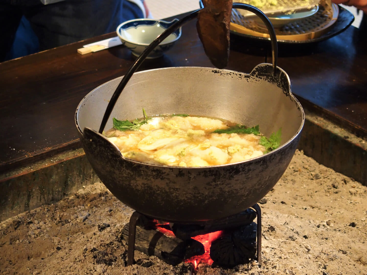 Cooking wasabi nabe on irori hearth