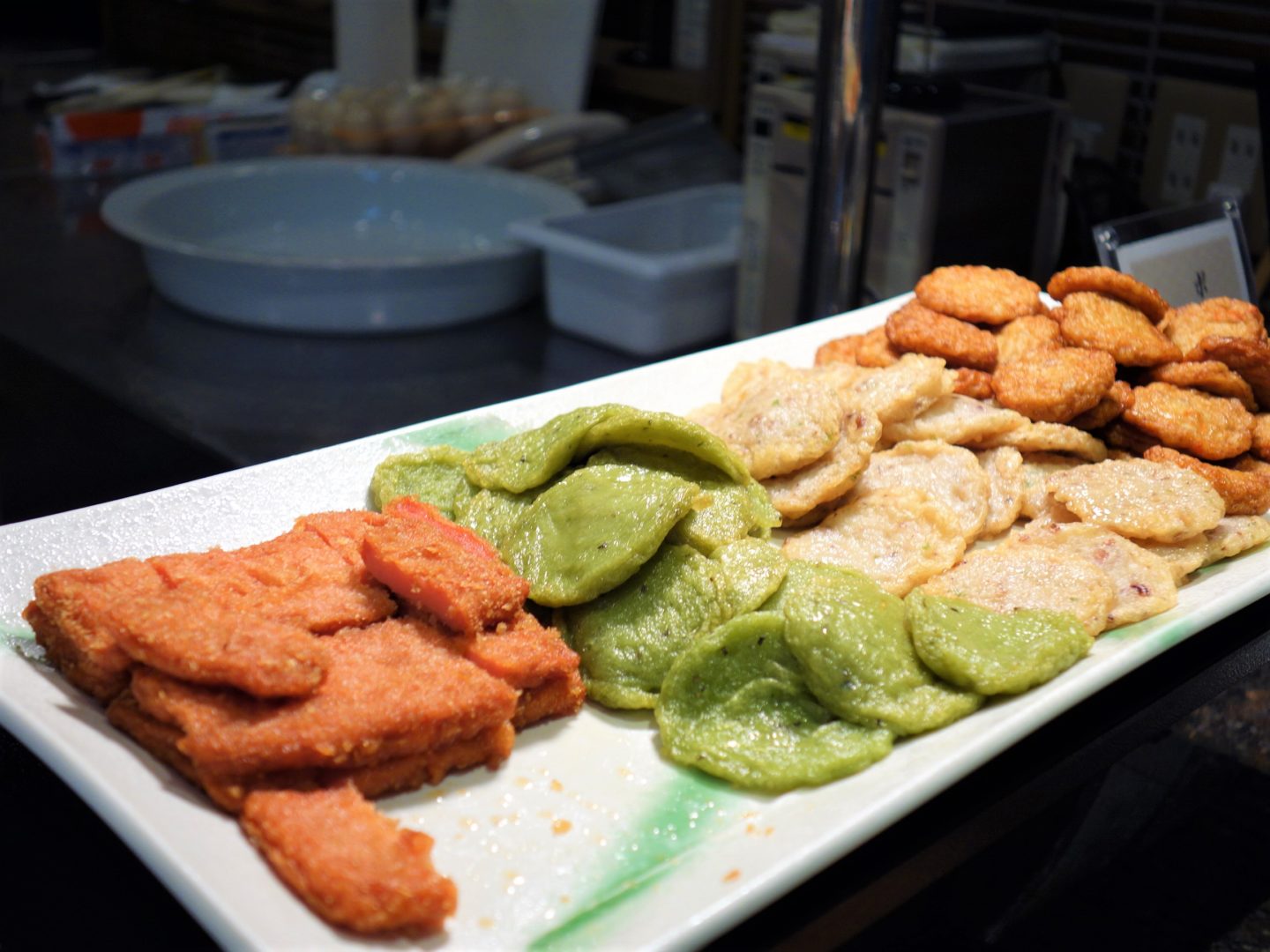"Akaten" (left) and various other types of deep-fried fish paste