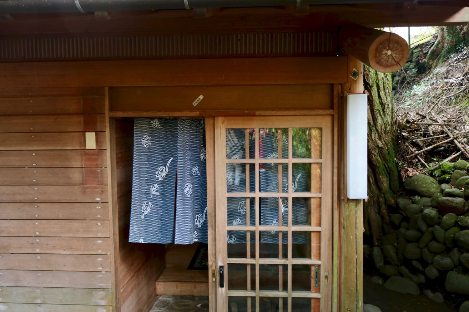 The "noren" curtain has the name "Ochiairo" printed on it