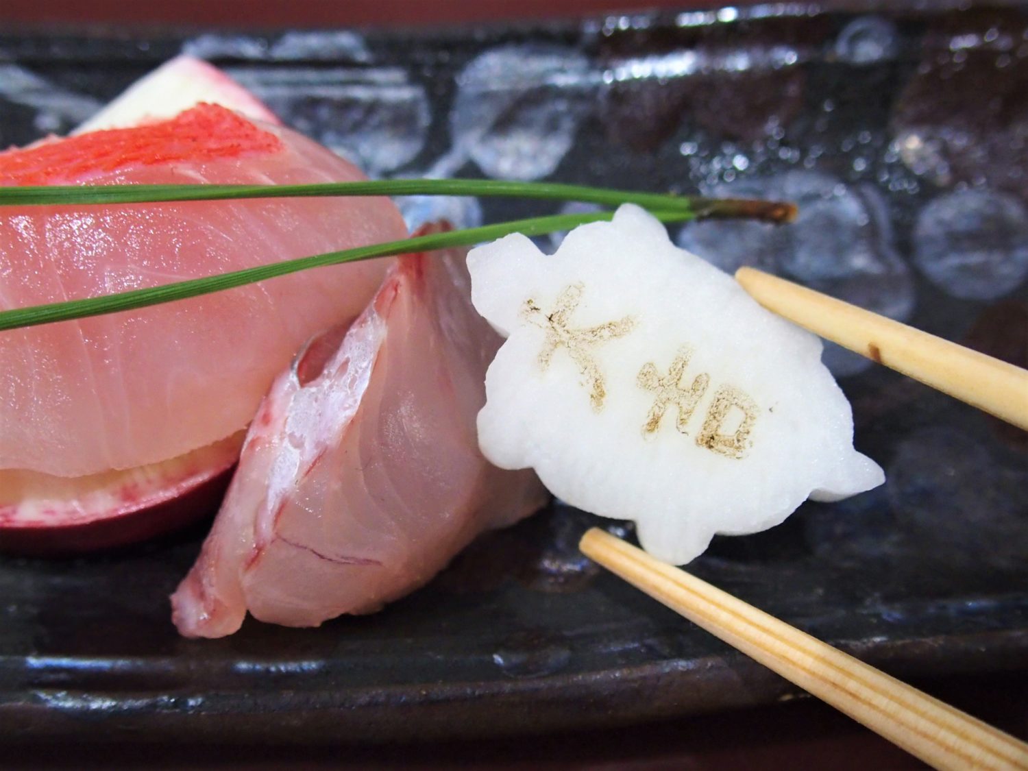 A daikon radish piece shaped like a turtle