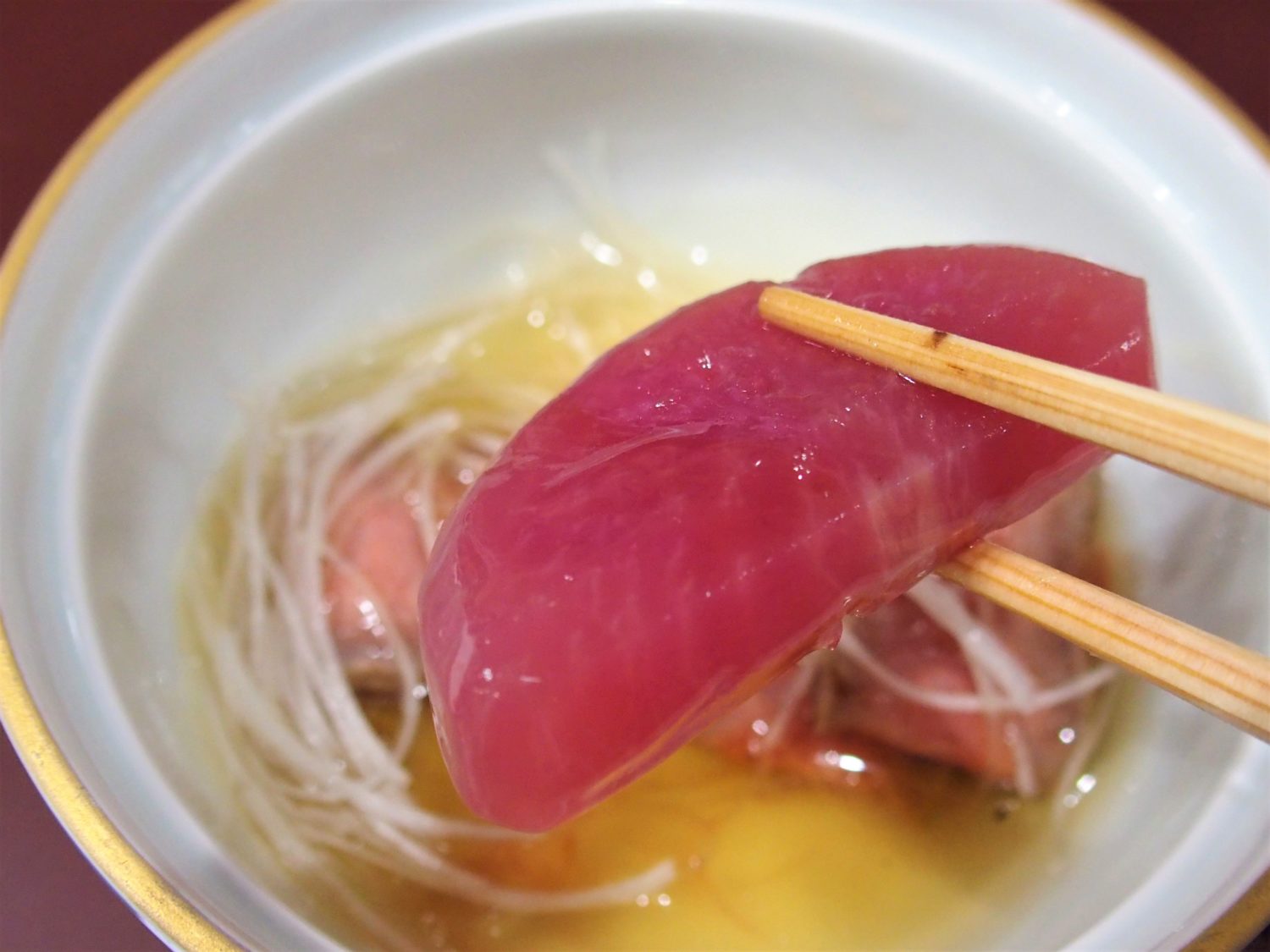 Simmered "beni kururi daikon" radish